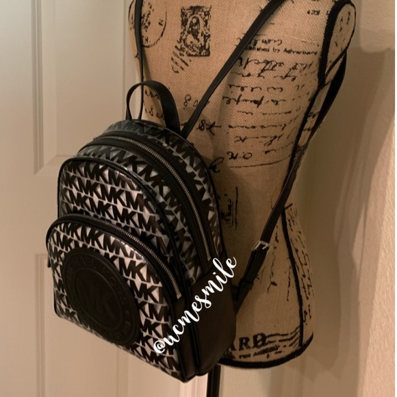Michael Kors Monogram Backpack - Picture 9 of 10